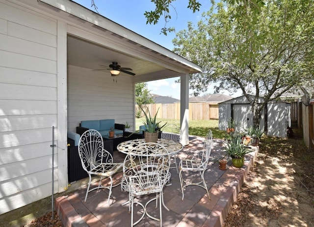 view of patio with ceiling fan and an outdoor living space