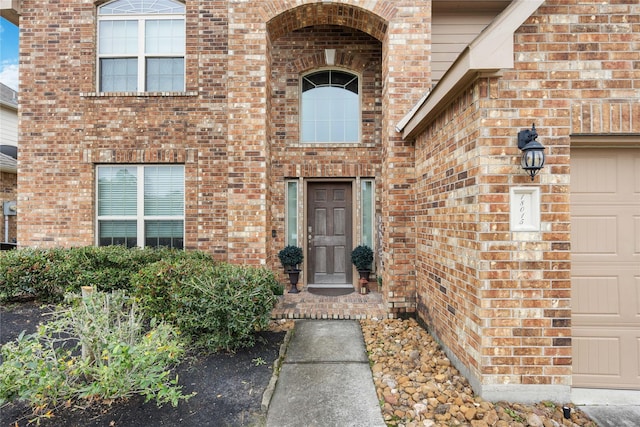 property entrance featuring a garage