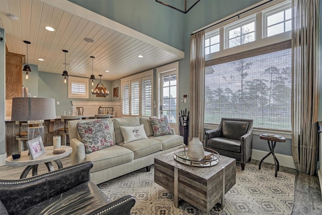 26210 Bluejack National Blvd Unit 14, Montgomery, TX 77316 - living room with a notable chandelier and wooden ceiling