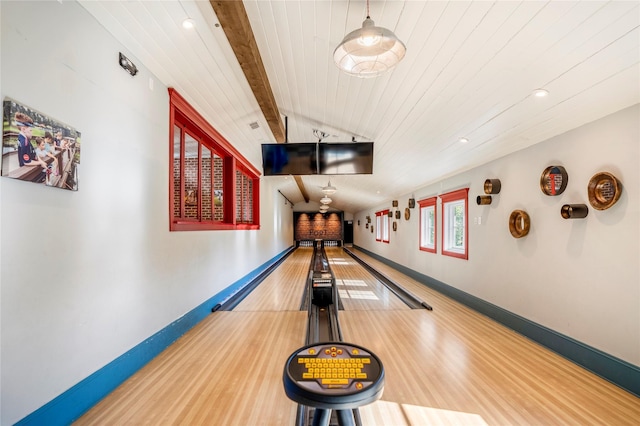 26210 Bluejack National Blvd Unit 14, Montgomery, TX 77316 - game room with hardwood / wood-style floors, bowling, plenty of natural light, and vaulted ceiling with beams