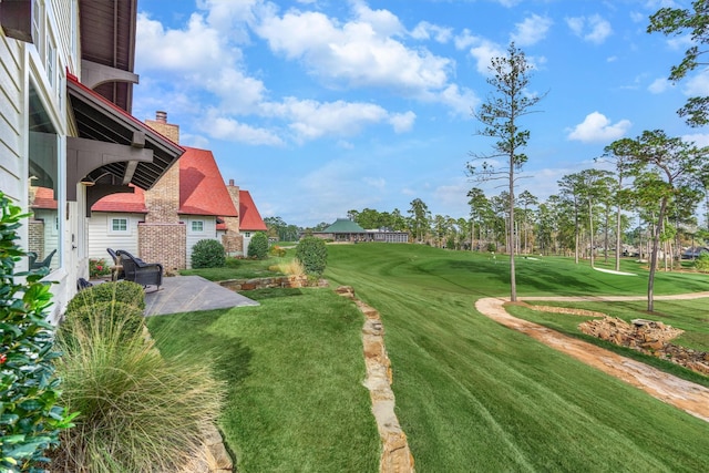 26210 Bluejack National Blvd Unit 14, Montgomery, TX 77316 - view of yard with a patio area