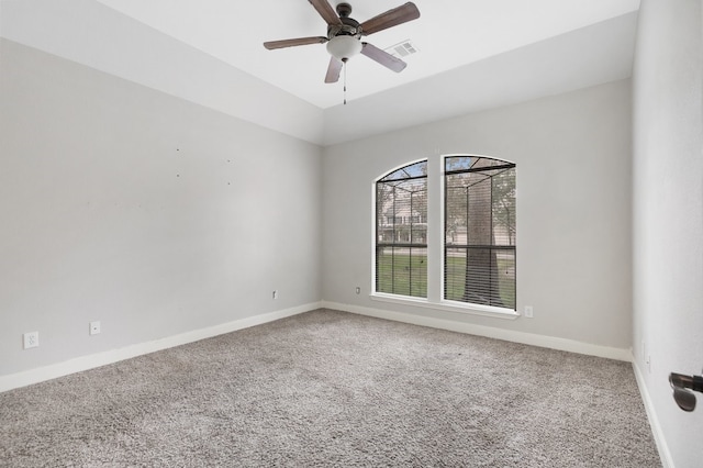 carpeted empty room with ceiling fan