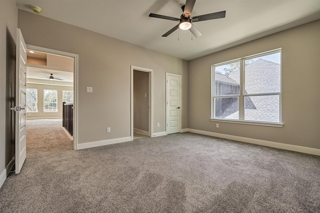 3050 Willowbend Rd, Montgomery, TX 77356 - unfurnished bedroom featuring carpet floors and a ceiling fan