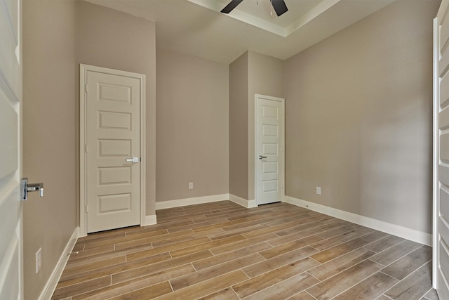 unfurnished bedroom featuring ceiling fan