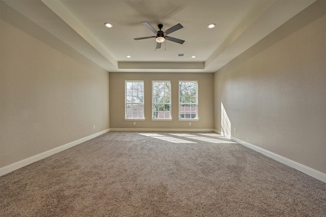 3050 Willowbend Rd, Montgomery, TX 77356 - carpeted spare room with a ceiling fan, recessed lighting, and a tray ceiling
