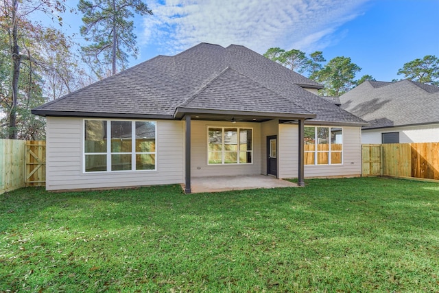 3050 Willowbend Rd, Montgomery, TX 77356 - back of house featuring a shingled roof, a fenced backyard, a ceiling fan, and a patio area