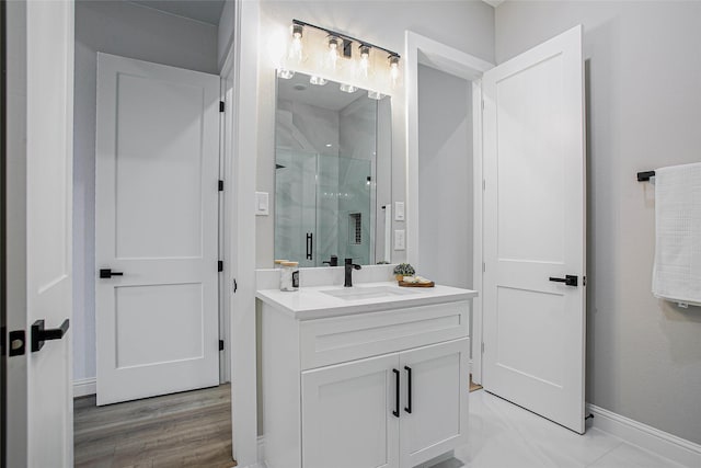 bathroom with vanity and walk in shower