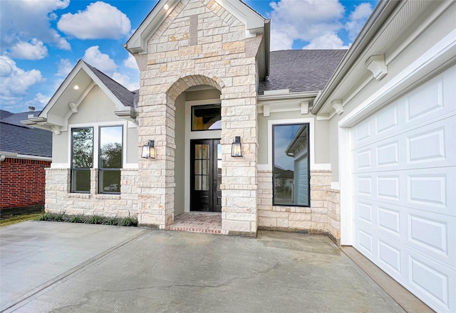 property entrance featuring a garage