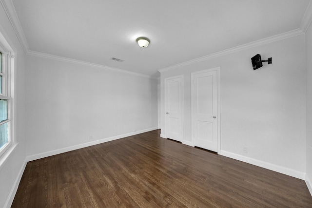 interior space featuring dark hardwood / wood-style floors and ornamental molding