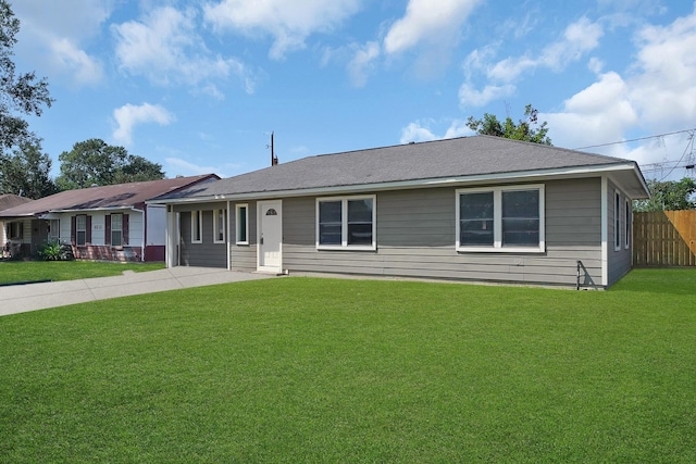 ranch-style house with a front yard