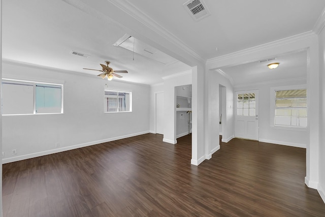 unfurnished living room featuring ornamental molding and dark wood-type flooring