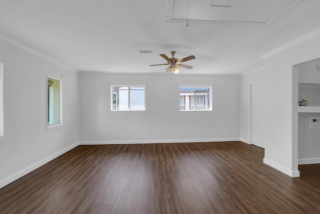 spare room featuring ceiling fan, dark hardwood / wood-style floors, and crown molding