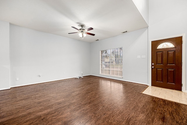 entrance foyer featuring ceiling fan and dark wood-type flooring