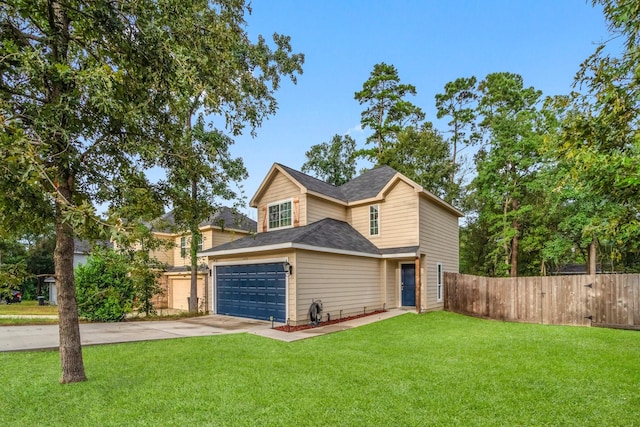 view of front of home featuring a front lawn and a garage