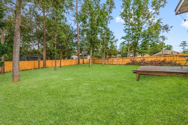 view of yard featuring a deck