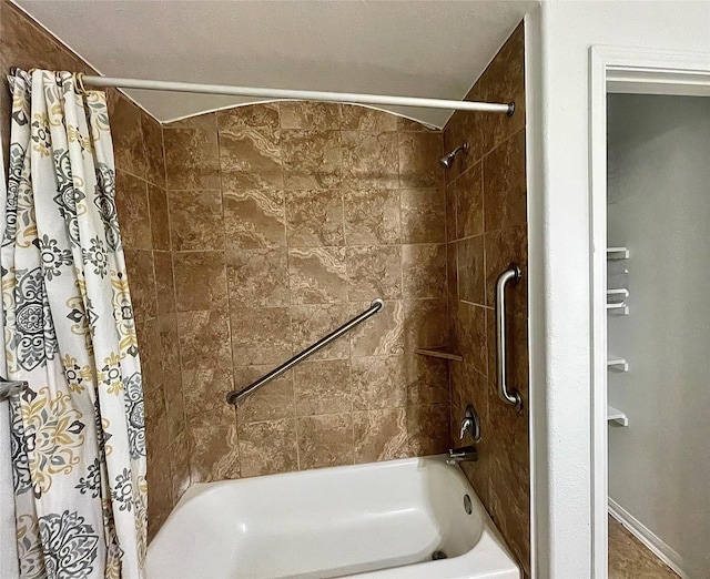 bathroom featuring shower / bath combo with shower curtain