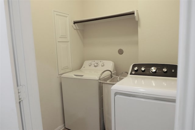 laundry room with washer and dryer