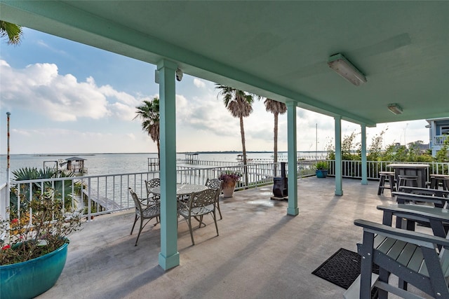 view of patio / terrace with a water view