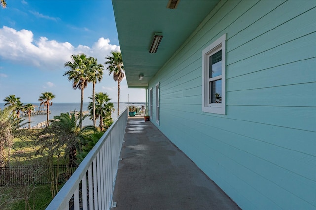 balcony featuring a water view