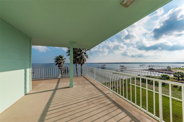 balcony featuring a water view