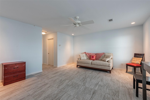 living room with ceiling fan