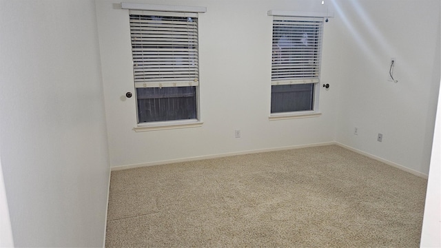 view of carpeted spare room