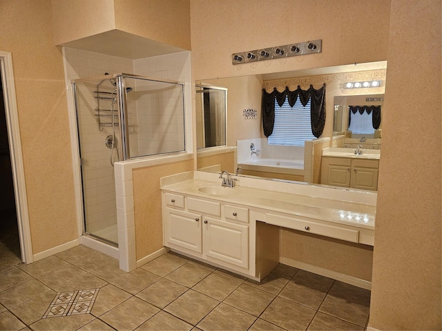 bathroom featuring vanity, separate shower and tub, and tile patterned floors