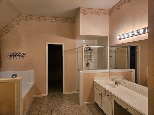 bathroom featuring vanity, tile patterned floors, and independent shower and bath