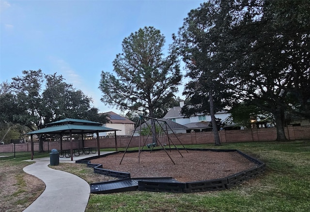 view of play area featuring a gazebo and a lawn