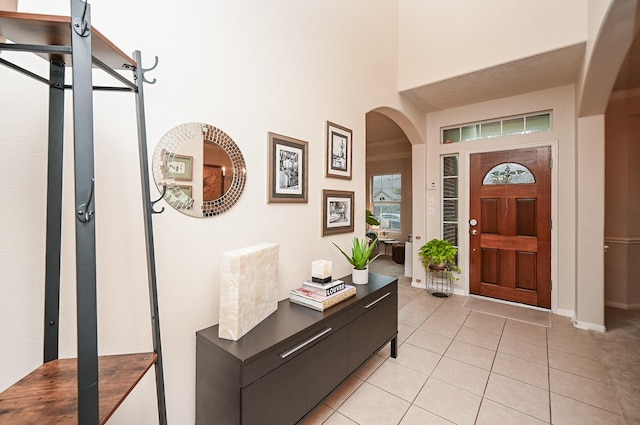 entryway featuring light tile patterned flooring