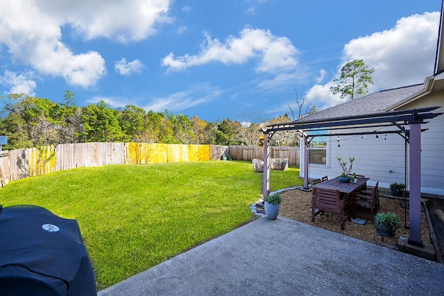 view of yard with a pergola and a patio