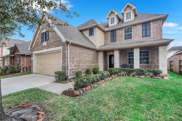 view of front facade featuring a front yard and a garage