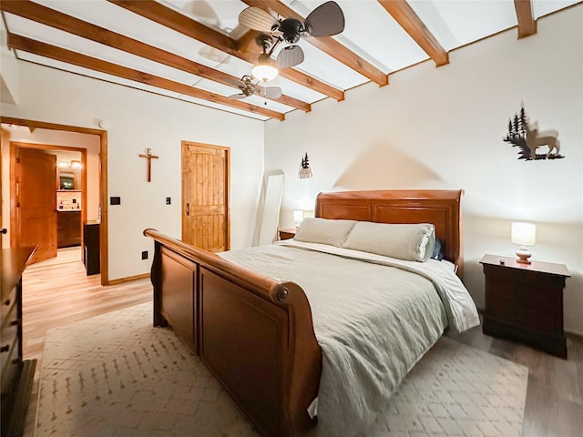 bedroom with beamed ceiling, ceiling fan, and light hardwood / wood-style flooring