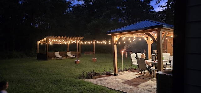 view of yard with a gazebo, a pergola, and a patio