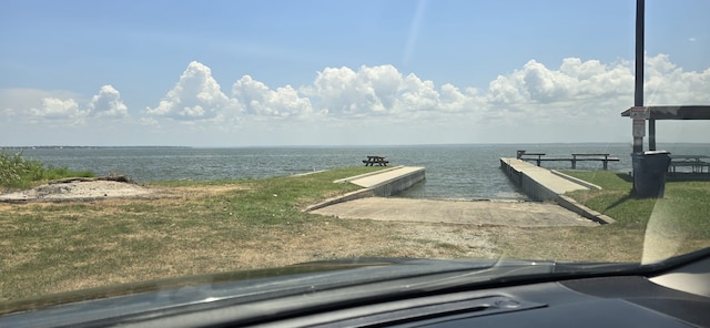 dock area with a water view