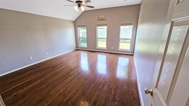 unfurnished room with ceiling fan, lofted ceiling, and hardwood / wood-style flooring