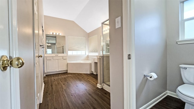 full bathroom with plus walk in shower, wood-type flooring, lofted ceiling, toilet, and vanity