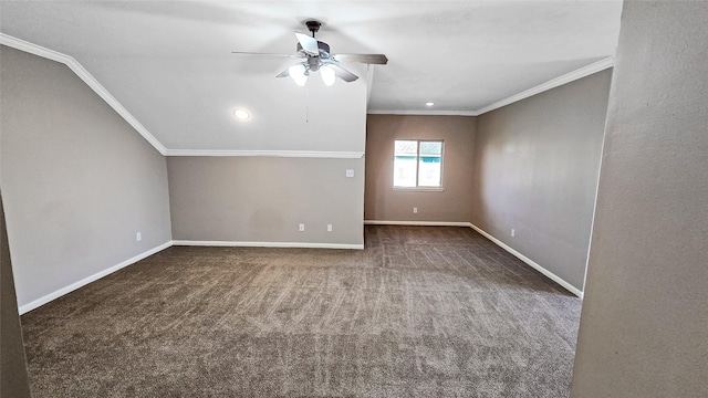 carpeted spare room with ceiling fan and ornamental molding