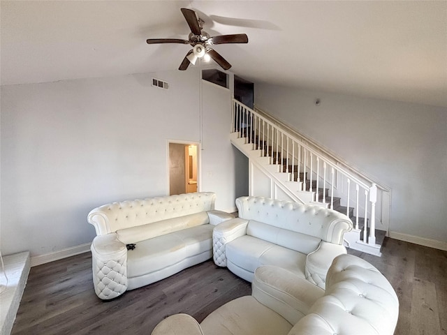 living room with ceiling fan, dark hardwood / wood-style flooring, and vaulted ceiling