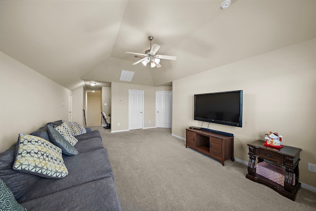 living room featuring ceiling fan, vaulted ceiling, and carpet