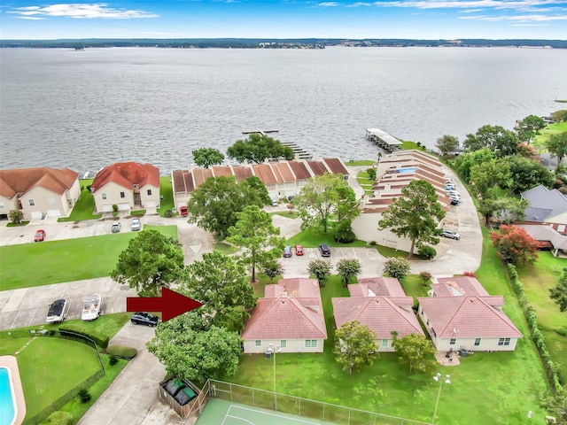 drone / aerial view with a water view