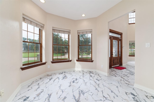 entrance foyer featuring a wealth of natural light