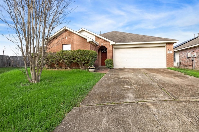 ranch-style house featuring a garage and a front yard