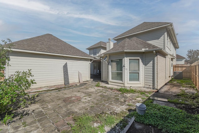 back of property featuring a patio