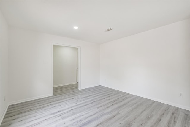 empty room featuring light hardwood / wood-style floors