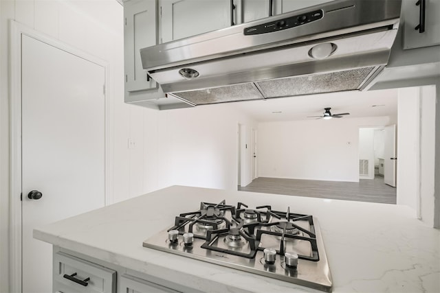 kitchen featuring ceiling fan and gas cooktop