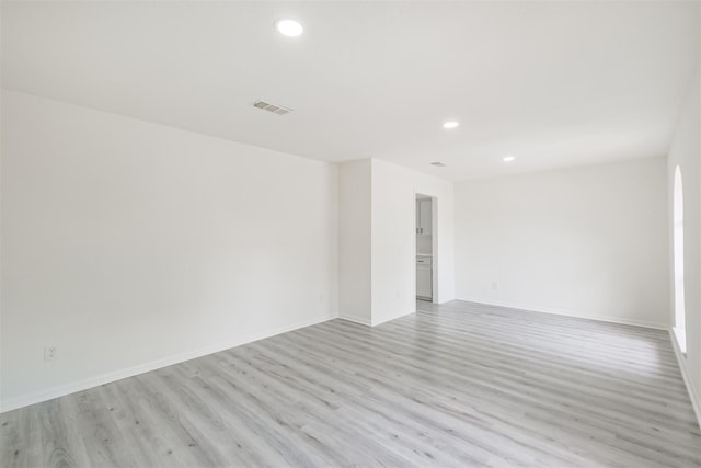 empty room featuring light hardwood / wood-style floors