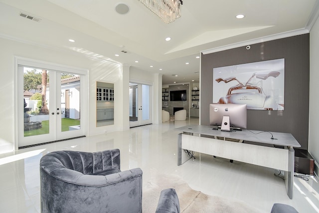 living room featuring vaulted ceiling, ornamental molding, and french doors