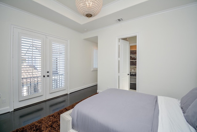 bedroom featuring access to exterior, ornamental molding, dark hardwood / wood-style floors, and french doors