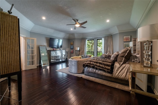 living room featuring ceiling fan, dark hardwood / wood-style floors, crown molding, a textured ceiling, and lofted ceiling